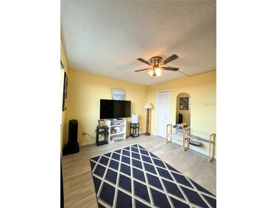 Welcome to this exquisitely updated 3-bedroom, 2-bath top-floor on Feather Sound Country Club in Florida - for sale on GolfHomes.com, golf home, golf lot