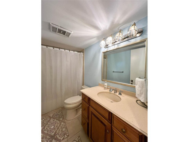 Welcome to this exquisitely updated 3-bedroom, 2-bath top-floor on Feather Sound Country Club in Florida - for sale on GolfHomes.com, golf home, golf lot