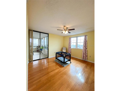 Welcome to this exquisitely updated 3-bedroom, 2-bath top-floor on Feather Sound Country Club in Florida - for sale on GolfHomes.com, golf home, golf lot