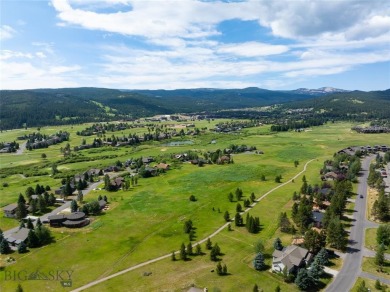 This charming log home, nestled in the trees and perched above on Big Sky of Montana Golf Course in Montana - for sale on GolfHomes.com, golf home, golf lot