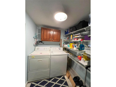 Welcome to this exquisitely updated 3-bedroom, 2-bath top-floor on Feather Sound Country Club in Florida - for sale on GolfHomes.com, golf home, golf lot