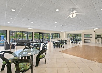 Welcome to this exquisitely updated 3-bedroom, 2-bath top-floor on Feather Sound Country Club in Florida - for sale on GolfHomes.com, golf home, golf lot