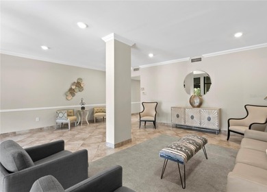 Welcome to this exquisitely updated 3-bedroom, 2-bath top-floor on Feather Sound Country Club in Florida - for sale on GolfHomes.com, golf home, golf lot