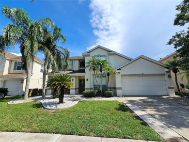 Set within the beautifully maintained and gated Remington Golf on Remington Golf Club in Florida - for sale on GolfHomes.com, golf home, golf lot