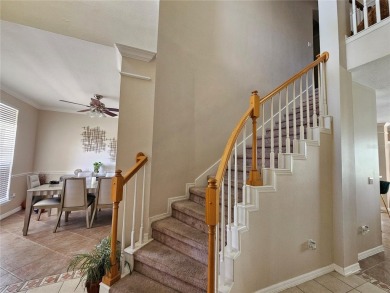 Set within the beautifully maintained and gated Remington Golf on Remington Golf Club in Florida - for sale on GolfHomes.com, golf home, golf lot
