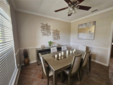 Set within the beautifully maintained and gated Remington Golf on Remington Golf Club in Florida - for sale on GolfHomes.com, golf home, golf lot