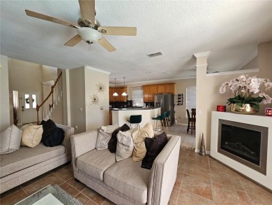 Set within the beautifully maintained and gated Remington Golf on Remington Golf Club in Florida - for sale on GolfHomes.com, golf home, golf lot