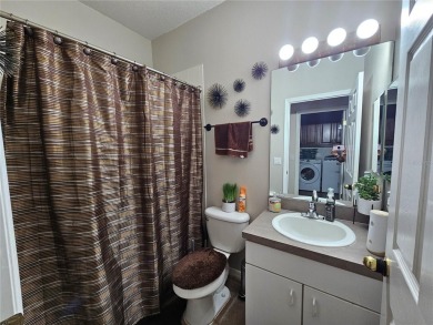 Set within the beautifully maintained and gated Remington Golf on Remington Golf Club in Florida - for sale on GolfHomes.com, golf home, golf lot
