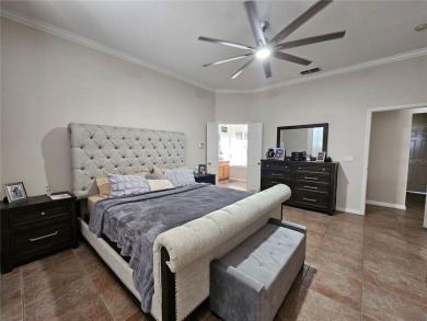 Set within the beautifully maintained and gated Remington Golf on Remington Golf Club in Florida - for sale on GolfHomes.com, golf home, golf lot