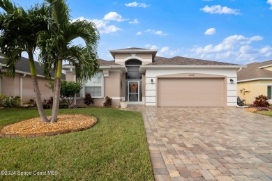 This meticulously maintained home offers stunning golf course on Viera East Golf Club in Florida - for sale on GolfHomes.com, golf home, golf lot