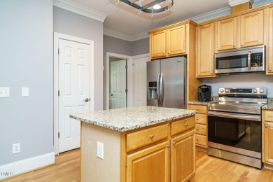 This exceptional property on a private wooded lot in the heart on Devils Ridge Golf Club in North Carolina - for sale on GolfHomes.com, golf home, golf lot