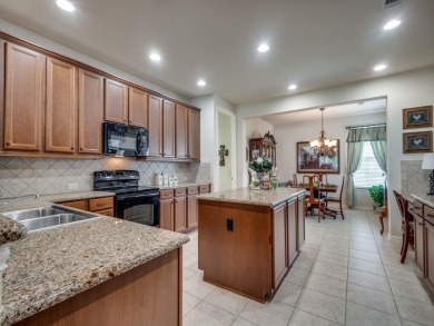 Stunning one story home with a Casita and courtyard in 55+ gated on Wildhorse Golf Club of Robson Ranch in Texas - for sale on GolfHomes.com, golf home, golf lot