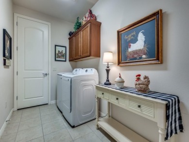 Stunning one story home with a Casita and courtyard in 55+ gated on Wildhorse Golf Club of Robson Ranch in Texas - for sale on GolfHomes.com, golf home, golf lot