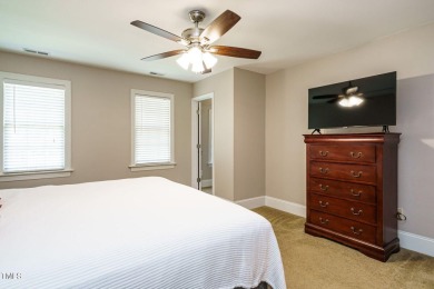 This exceptional property on a private wooded lot in the heart on Devils Ridge Golf Club in North Carolina - for sale on GolfHomes.com, golf home, golf lot