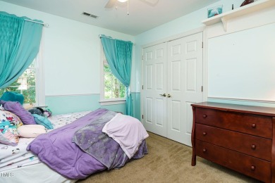 This exceptional property on a private wooded lot in the heart on Devils Ridge Golf Club in North Carolina - for sale on GolfHomes.com, golf home, golf lot