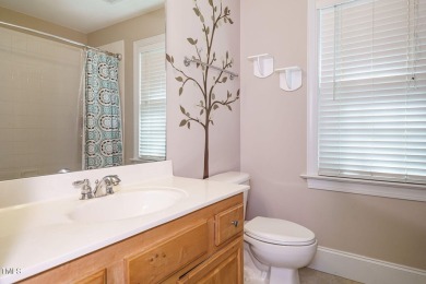 This exceptional property on a private wooded lot in the heart on Devils Ridge Golf Club in North Carolina - for sale on GolfHomes.com, golf home, golf lot