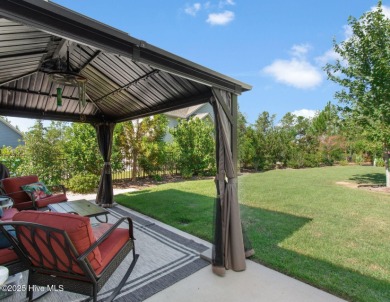 Welcome to 3132 Inland Cove, a charming custom coastal cottage on Members Club At St. James Plantation in North Carolina - for sale on GolfHomes.com, golf home, golf lot
