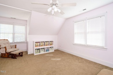 This exceptional property on a private wooded lot in the heart on Devils Ridge Golf Club in North Carolina - for sale on GolfHomes.com, golf home, golf lot
