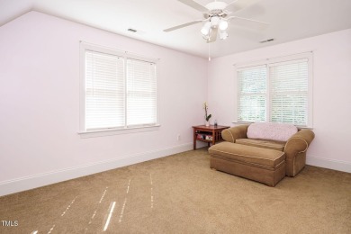 This exceptional property on a private wooded lot in the heart on Devils Ridge Golf Club in North Carolina - for sale on GolfHomes.com, golf home, golf lot