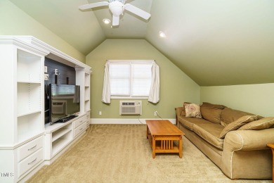 This exceptional property on a private wooded lot in the heart on Devils Ridge Golf Club in North Carolina - for sale on GolfHomes.com, golf home, golf lot