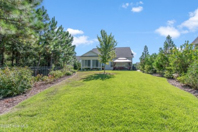 Welcome to 3132 Inland Cove, a charming custom coastal cottage on Members Club At St. James Plantation in North Carolina - for sale on GolfHomes.com, golf home, golf lot