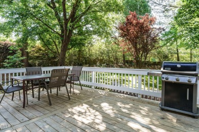 This exceptional property on a private wooded lot in the heart on Devils Ridge Golf Club in North Carolina - for sale on GolfHomes.com, golf home, golf lot