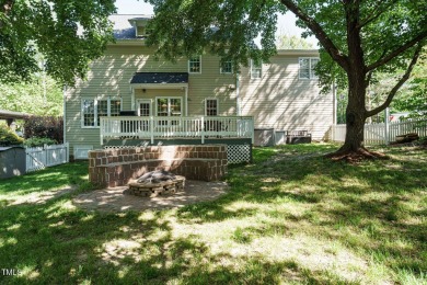 This exceptional property on a private wooded lot in the heart on Devils Ridge Golf Club in North Carolina - for sale on GolfHomes.com, golf home, golf lot