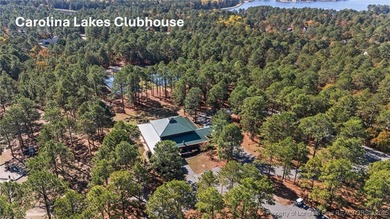 Escape to the sought-after, gated community of Carolina Lakes on Carolina Lakes Country Club in North Carolina - for sale on GolfHomes.com, golf home, golf lot