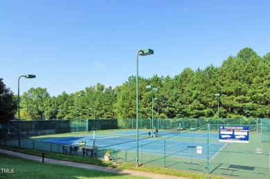 This exceptional property on a private wooded lot in the heart on Devils Ridge Golf Club in North Carolina - for sale on GolfHomes.com, golf home, golf lot