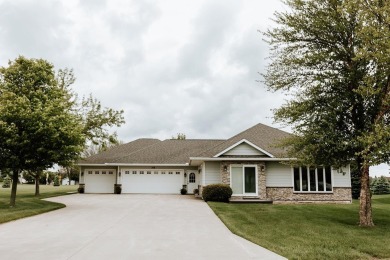 This beautifully maintained ranch home sits on over half an acre on The Ridge Golf Club in Iowa - for sale on GolfHomes.com, golf home, golf lot