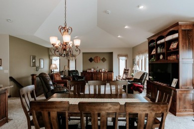 This beautifully maintained ranch home sits on over half an acre on The Ridge Golf Club in Iowa - for sale on GolfHomes.com, golf home, golf lot