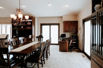 This beautifully maintained ranch home sits on over half an acre on The Ridge Golf Club in Iowa - for sale on GolfHomes.com, golf home, golf lot