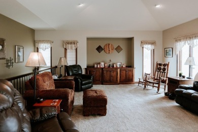 This beautifully maintained ranch home sits on over half an acre on The Ridge Golf Club in Iowa - for sale on GolfHomes.com, golf home, golf lot