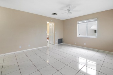 Welcome to this 2-bed, 2-bath home in the 55+ Palm Beach on Leisureville Community Golf Course in Florida - for sale on GolfHomes.com, golf home, golf lot