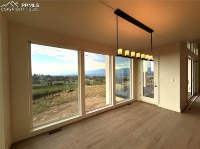 This stunning new Goetzmann Custom Home offers over 5,000 square on The Club At Flying Horse in Colorado - for sale on GolfHomes.com, golf home, golf lot