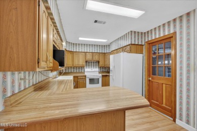 A unique find in a high, dry location in Diamondhead.  This 3 on Diamondhead Country Club in Mississippi - for sale on GolfHomes.com, golf home, golf lot