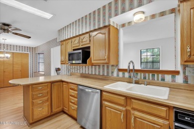 A unique find in a high, dry location in Diamondhead.  This 3 on Diamondhead Country Club in Mississippi - for sale on GolfHomes.com, golf home, golf lot