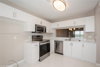 Renovated 2 bedroom 2 bathroom condo offers fresh paint, good on Sunrise Lakes Phase IV Golf Course in Florida - for sale on GolfHomes.com, golf home, golf lot