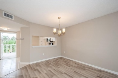 Renovated 2 bedroom 2 bathroom condo offers fresh paint, good on Sunrise Lakes Phase IV Golf Course in Florida - for sale on GolfHomes.com, golf home, golf lot