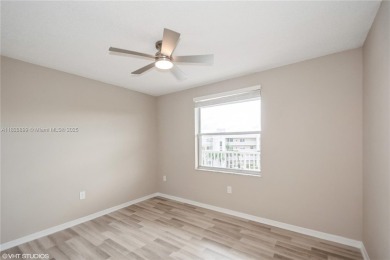 Renovated 2 bedroom 2 bathroom condo offers fresh paint, good on Sunrise Lakes Phase IV Golf Course in Florida - for sale on GolfHomes.com, golf home, golf lot