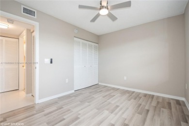 Renovated 2 bedroom 2 bathroom condo offers fresh paint, good on Sunrise Lakes Phase IV Golf Course in Florida - for sale on GolfHomes.com, golf home, golf lot