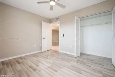 Renovated 2 bedroom 2 bathroom condo offers fresh paint, good on Sunrise Lakes Phase IV Golf Course in Florida - for sale on GolfHomes.com, golf home, golf lot