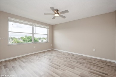 Renovated 2 bedroom 2 bathroom condo offers fresh paint, good on Sunrise Lakes Phase IV Golf Course in Florida - for sale on GolfHomes.com, golf home, golf lot