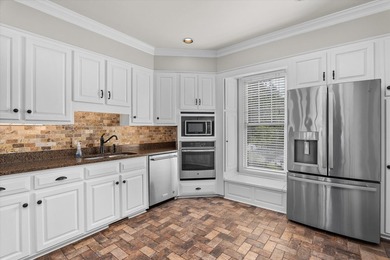 Welcome to 3684 Inverness Way, a stunning all-brick home located on West Lake Country Club in Georgia - for sale on GolfHomes.com, golf home, golf lot