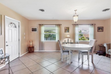 Flamingo house. Charming Floridian home, meticulously maintained on Jacaranda West Country Club in Florida - for sale on GolfHomes.com, golf home, golf lot