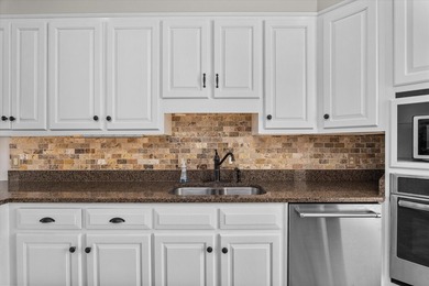 Welcome to 3684 Inverness Way, a stunning all-brick home located on West Lake Country Club in Georgia - for sale on GolfHomes.com, golf home, golf lot