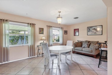 Flamingo house. Charming Floridian home, meticulously maintained on Jacaranda West Country Club in Florida - for sale on GolfHomes.com, golf home, golf lot