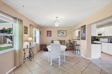 Flamingo house. Charming Floridian home, meticulously maintained on Jacaranda West Country Club in Florida - for sale on GolfHomes.com, golf home, golf lot