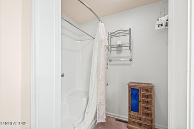 Looking for a peaceful lakefront home in a resort community? on Druid Hills Golf Club in Tennessee - for sale on GolfHomes.com, golf home, golf lot