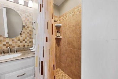 Flamingo house. Charming Floridian home, meticulously maintained on Jacaranda West Country Club in Florida - for sale on GolfHomes.com, golf home, golf lot